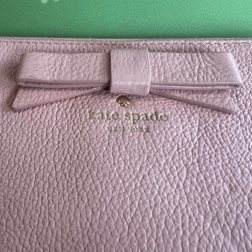 Kate Spade New York Pink Pebbled Leather Bow Wristlet Wallet PWRU4444